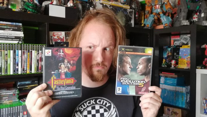 retrogamepapa met twee games bij mn gamecollectie